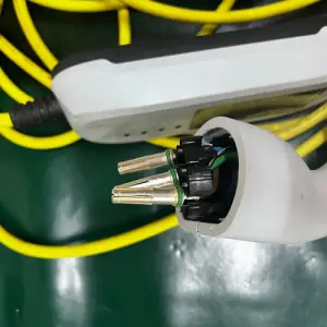 Broken Tata EV Charger with pins coming out